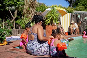 Poolside Prints: Mother and daughters at sunny summer swimming pool