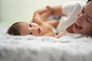 Parenting Prints: mother enjoying with her baby