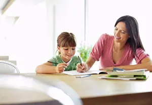 Examining Prints: Mother helping daughter with homework