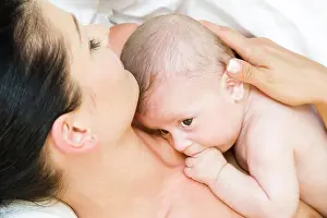 Babe Prints: Mother hugging her baby