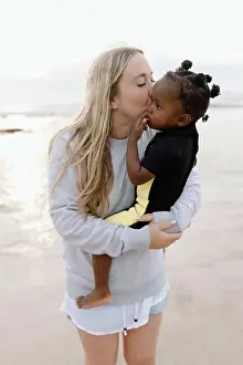 Expressive Prints: Mother kissing her adopted daughter