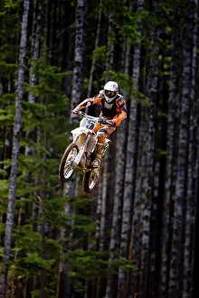 Baby Boomer Prints: Motocross rider getting big air off of large double jump in motocross Race in Campbell River
