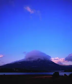 Covering Prints: Mount Errigal, Co Donegal, Ireland, Clouds over the top of a mountain