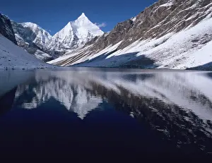 Howie Garber Prints: Mount Jichu Drake reflected in Sophu lake, Jigme Dorji National Park, Bhutan