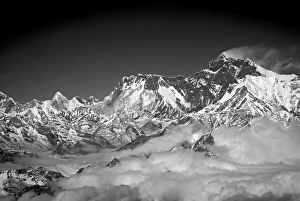Nepal Prints: Mt Everest with its customary plume of cloud blowing off the summit