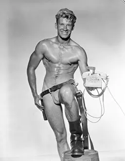 Leather Prints: Muscular Blond Lineman in Belt, Boots with Phone c.1962