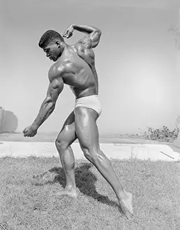 Bodybuilder Prints: Muscular Bodybuilder Poses in White Trunks c.1957