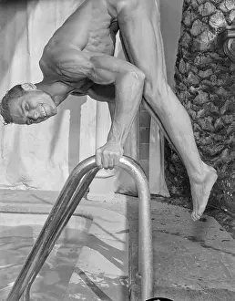 Attractive Prints: Muscular Nude Male Handstands Over Pool c.1959