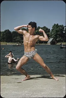 Attractive Prints: Muscular Young Male Shows Biceps Flex Near Lake c.1953