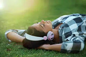 Good Prints: Music headphones, park or woman on lawn to relax for rest in garden