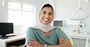 Muslim dentist, woman and happy with face