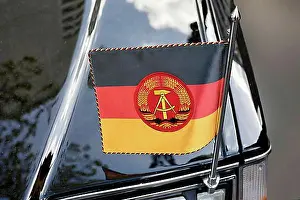 Cars Prints: National flag of the GDR on a state coach Volvo 264 TE