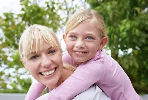 Carry Prints: Nature, piggyback and portrait of mom with kid playing in an outdoor park