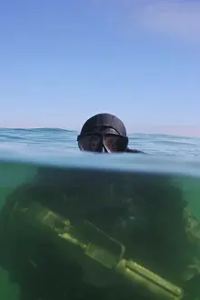 Diving Equipment Prints: A Navy SEAL combat swimmer, diving a oxygen rebreather