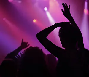 Live Prints: Neon, light and people dancing at concert or music festival