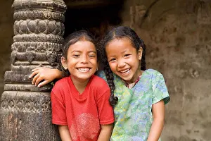Nepal Prints: Nepal, Kathmandu, Bhaktapur, two adorable little local girls giggling