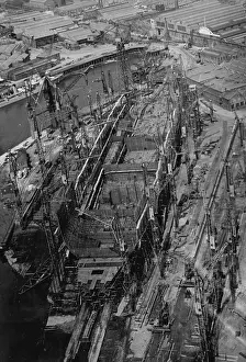 Merchant Shipping Prints: New Cunarder Takes Shape -- An aerial view of the '552' sister ship to the Queen Mary as it appeared over