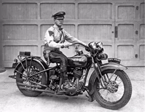 1930 Prints: New Jersey: 1930. Trooper Haley of the New Jersey State Police poses on his Harley Davidson motorcycle