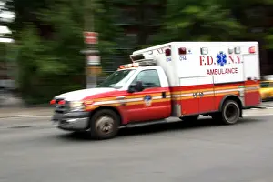 Ambulance Prints: New York Fire Department ambulance in motion in Manhattan, New York City, New York, USA