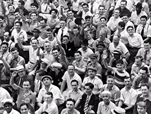 Seated Prints: New York, New York: c. 1938. Happy baseball fans in the bleachers at Yankee Stadium