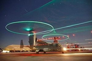 Maintenance Prints: Nighttime view of a U.S. Marine Corps MV-22 Osprey taxiing out to launch at Camp Bastion