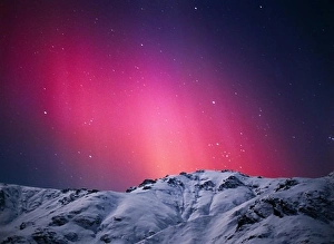 Luminous Prints: The Northern Light's auroral colors are produced when charged solar particles strike single atoms of oxygen