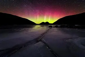 Frozen Prints: The Northern Lights over frozen Jordan Pond in Acadia National Park
