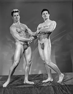 Bodybuilder Prints: Two Nude Bodybuilders in Classic Mutual Pose c.1949