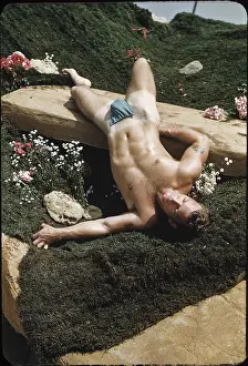 Attractive Prints: Nude Male Reclines in a Garden c.1949