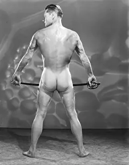 Bodybuilder Prints: Nude Male with Sword from Behind c.1951