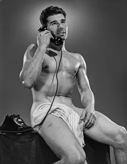 Bodybuilder Prints: Nude Muscular Bodybuilder on Telephone c.1949