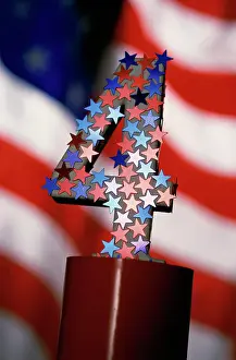 Star Prints: Number four covered with stars and the American flag in the background