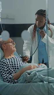 Oxygen Prints: Nurse and african american specialist consulting patient