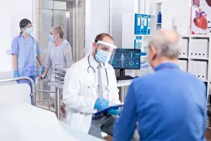 Speaking Prints: Nurse helping disabled old woman