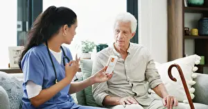 Advice Prints: Nurse, pills and help with old man on sofa for medical treatment