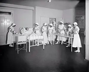 Early 1900s People Prints: Nurse taking the pulse of a patient at the Homeopathic Hospital