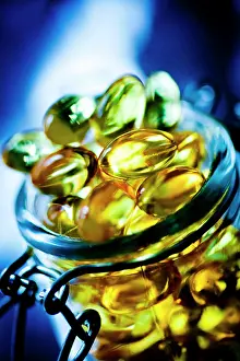 Care Wellness Prints: Nutritional supplements. Liquid nutritional supplements in capsules