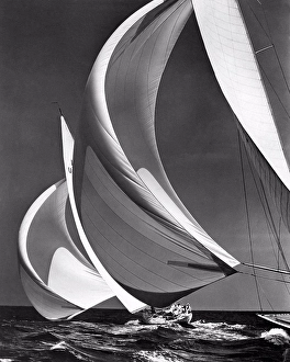 Compete Prints: Ocean: c. 1940's. Two sailboats racing with their spinakers on a reach
