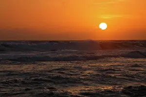 Oceanic Prints: Ocean sunset with large sun