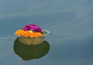 India Prints: Offerings for puja or worship in the Ganges River