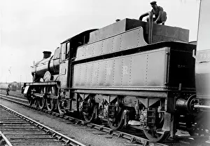 Rail Prints: Oil-Fuelled Passenger Locomotives -- The fireman checking the oil supply
