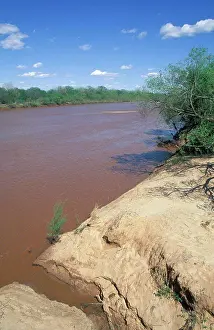 Muddy Prints: Oklahoma, Cushing. Cimarron River. Muddy River Bed