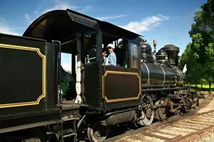 Rail Prints: Old-fashioned train and conductor