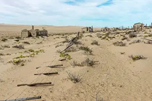 Sand Prints: Old fence in the abandoned (1954) German diamond mining settlement of Kolmanskop (ghost town) near Luderitz