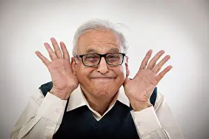 Facial Expression Prints: Old man making funny face with hands in his ears