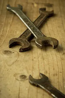 Hardware Prints: old open end wrenches old vintage retro used open-end wrenches on wooden table Copyright: xZoonar