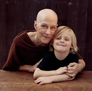 Bald Prints: Older Caucasian cancer survivor with grandson