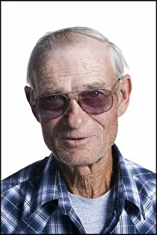 Model Release Prints: Older man in plaid shirt wearing sunglasses