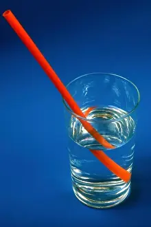 Slow Prints: Optical Displacement of Straw in Glass of Water
