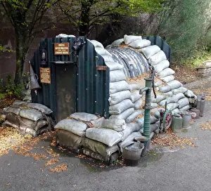 Shelter Prints: An original Second World War Anderson shelter, a small prefabricated air-raid shelter